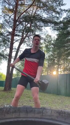 Backyard tire and sledgehammer workout in Krasnoturansk, Russia