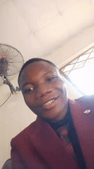 Indoor gathering documented in Madalla, Nigeria with selfies and seating