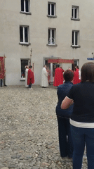 Religious procession draws observers in Biasca cobblestone square