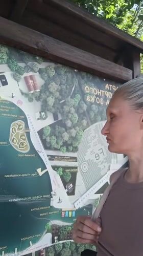 Tourist explores Zheleznovodsk park attractions and lakefront during morning visit