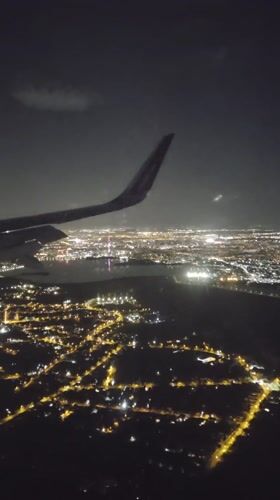 Wizz Air passenger documents flight over Bucharest from takeoff to sunset
