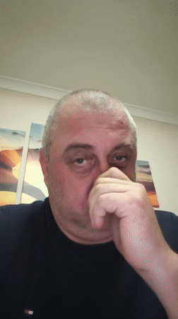 Man documents evening at home with moon lamp selfies