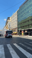 Prague fire crew douses hotel blaze amid busy city streets