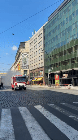 Prague fire crew douses hotel blaze amid busy city streets