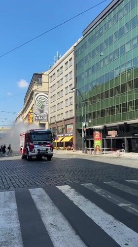Prague fire crew douses hotel blaze amid busy city streets