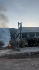 Fire burns behind Adria Express cafe in Tresnjica, Montenegro
