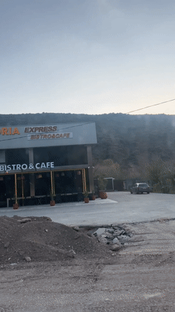 Fire burns behind Adria Express cafe in Tresnjica, Montenegro