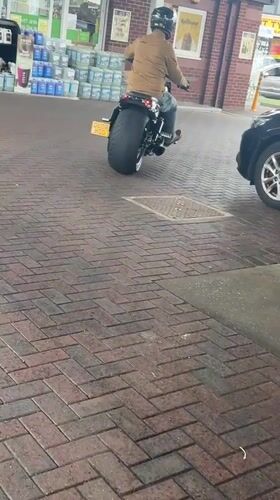 Wide-tire motorcycle at a Great Yarmouth gas station