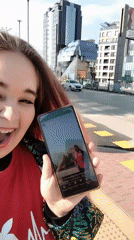 Woman takes selfie video on Plovdiv street