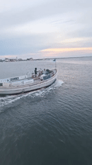 Evening boat activity around Nantucket pier waters