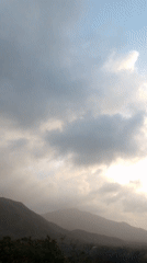 Motorcyclist documents dramatic evening skies in Tacarigua, Venezuela