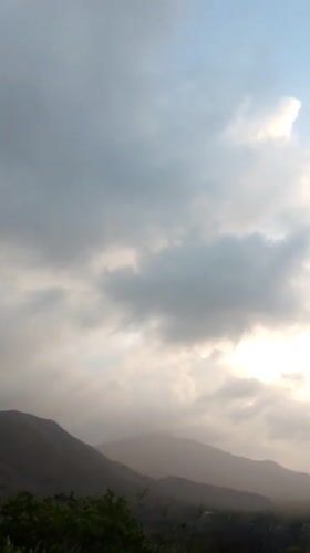 Motorcyclist documents dramatic evening skies in Tacarigua, Venezuela