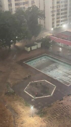 Rainy evening documented from apartment balcony in Ciudad Guayana