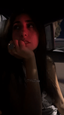 Car and motorcycle scenes on a Tel Aviv night