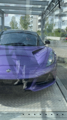 Purple Lotus Emira displayed in Cologne showroom, priced 116,750 EUR