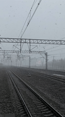 Snow falls on Moscow railway tracks in April
