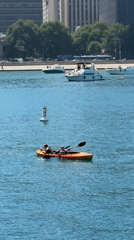 Kayaking the Chicago waterfront with the skyline in view