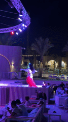 Belly dance performance under colorful stage lights in Sharm El Sheikh
