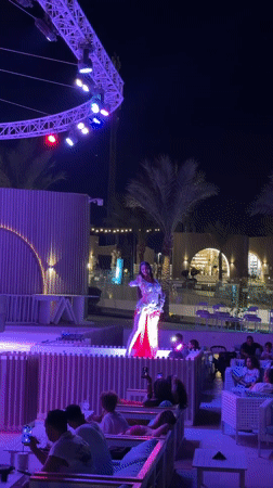 Belly dance performance under colorful stage lights in Sharm El Sheikh