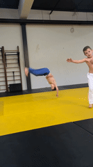 Children practice judo throws at Krasnoyarsk gymnasium