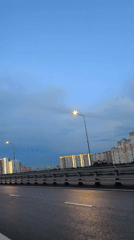 Evening walk documented across Moscow bridges and construction zones