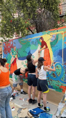Artists create public space mural in Madrid neighborhood