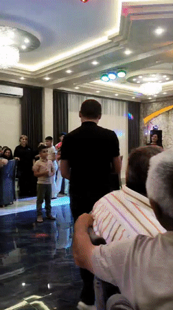 Wedding reception underway at a banquet hall in Sevan, Armenia