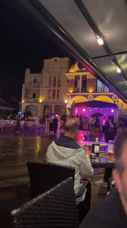 Rainy night out in Batumi — live music, wet streets, cold beers