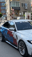 Custom BMW with geometric paint drives through Veliko Tarnovo