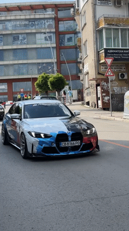 Custom BMW with geometric paint drives through Veliko Tarnovo