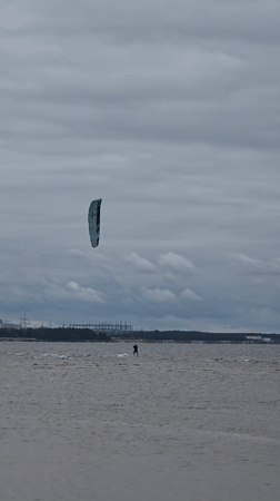Kitesurfing and beach life in Sosnoviy Bor, nuclear plant backdrop