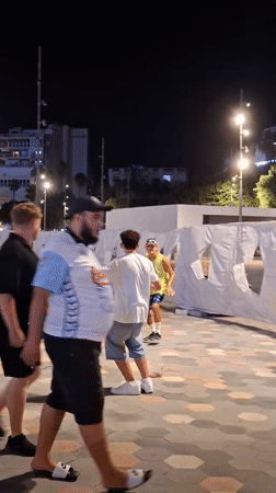 Evening stroll along a Torrevieja walkway