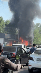 Car fire produces heavy smoke on Tashkent street