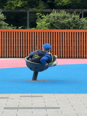 Family playground time in Moscow park