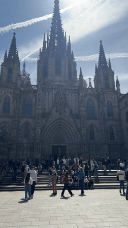 Street musicians perform near Gothic cathedral in Barcelona