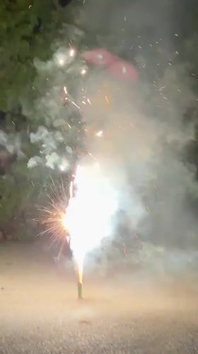 Fourth of July fireworks light up Wheeling neighborhood streets at night