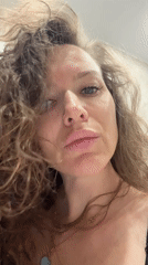 Woman photographed in bathroom setting in Dolgoprudny, Russia