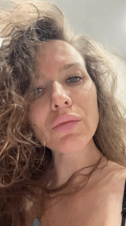 Woman photographed in bathroom setting in Dolgoprudny, Russia