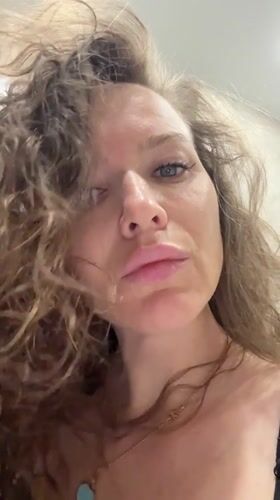 Woman photographed in bathroom setting in Dolgoprudny, Russia