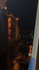 Night passage through a canal lock near Dubna, Russia