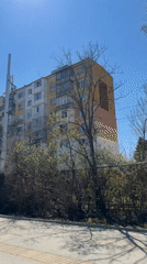 Apartment building filmed in Sofia showing weathered facade