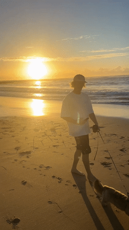 Sunrise beach activities captured at Bulli Beach, Australia