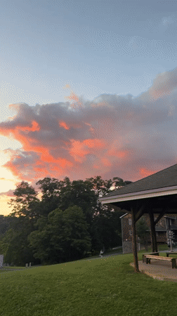 Striking summer sunset over Washington Township's rural landscape