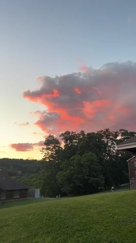 Striking summer sunset over Washington Township's rural landscape