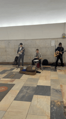 Three-piece band performs in Moscow subway station