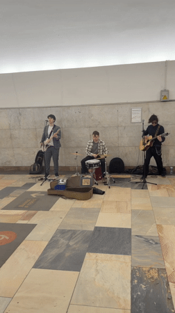 Three-piece band performs in Moscow subway station
