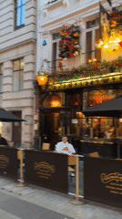 Evening London Underground journey documents pubs, stations, football viewing