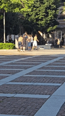 Young men skateboard, BMX in urban plaza Friday afternoon