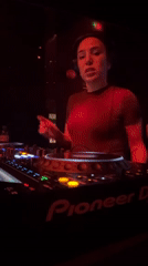 Female DJ performs multi-venue set across Moscow nightclubs