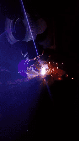 Welding sparks and sleeping kittens in Fergana City